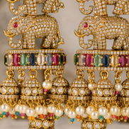 Royal Elephant Traditional Jhumka Earrings with Multicolour Stones & White Bead Drops